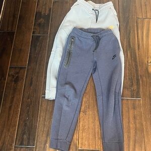 Two Pairs of Kids Nike Tech Fleece Jogger sweatpants